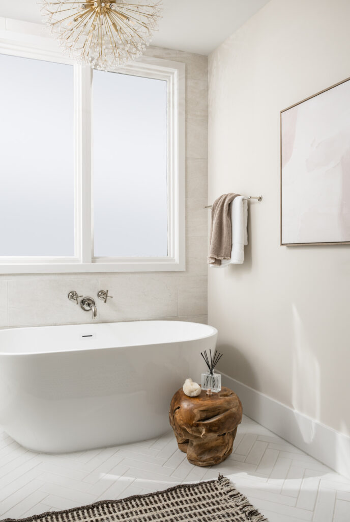 Luxury ensuite bathroom in Santa Ynez home with built in arches and free standing tub