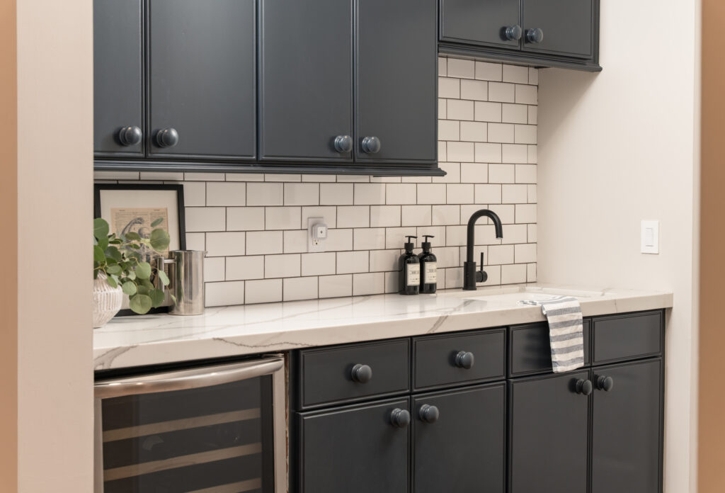 butler's pantry in santa ynez with subway tile and painted wood knob hardware